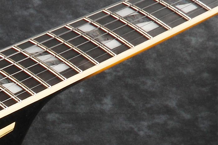 Medium frets with Artstar fret edge treatment