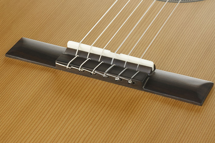 Puente de guitarra clásica de 12 agujeros