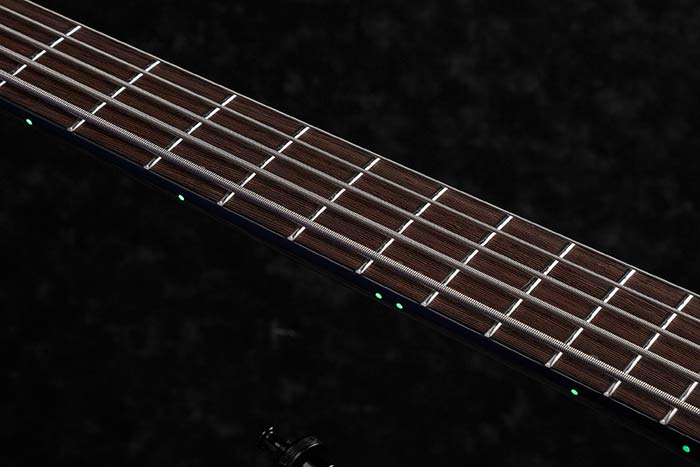 Luminescent side dot inlays