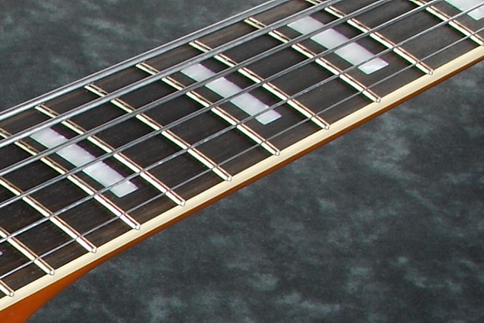 Jumbo frets with Prestige fret edge treatment